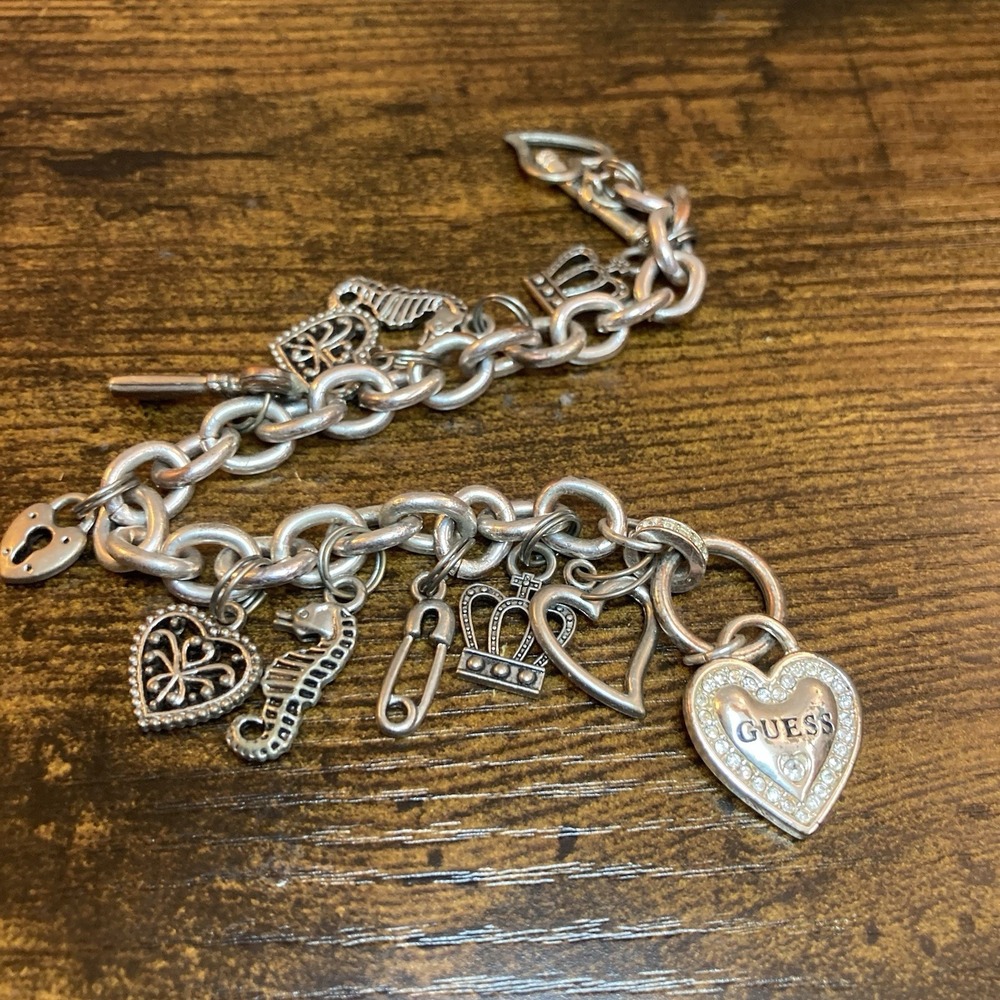 Guess Charm Bracelet 7" Silver Tone Heart Crown Horseshoe Seahorse Toggle